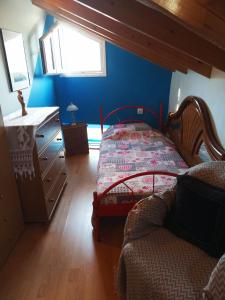 A bed or beds in a room at Irene's loft