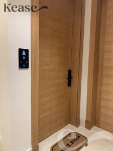 a door with a clock on the side of it at Kease Malqa B-11 Royal touch AZ60 in Riyadh