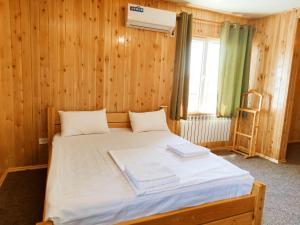 Кровать или кровати в номере SilkRoad Guesthouse