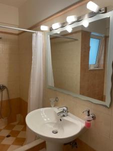 Ванная комната в Dais Apartments +37 фотографий