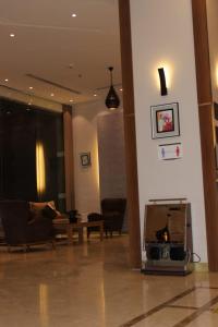 Ruang duduk di alfakhama almasia Serviced Apartments-الفخامة الماسية للوحدات السكنية المفروشة