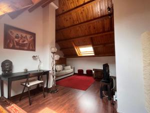 Posedenie v ubytovaní Duplex 80 m2 con vistas a la montaña