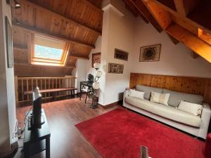 Posedenie v ubytovaní Duplex 80 m2 con vistas a la montaña