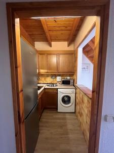 Kuchyňa alebo kuchynka v ubytovaní Duplex 80 m2 con vistas a la montaña