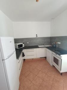 Cucina o angolo cottura di Maison dans le centre de messanges