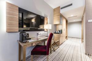 Kuchyň nebo kuchyňský kout v ubytování Hotel Wieniawski