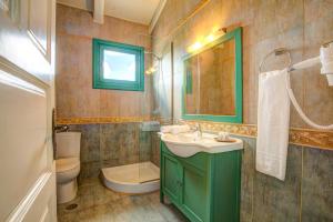 A bathroom at Villa Amari by Villa Plus