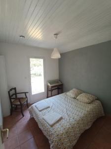 Letto o letti in una camera di Maison dans le centre de messanges