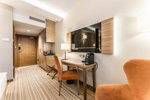 TV a/nebo společenská místnost v ubytování Hotel Wieniawski