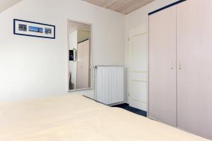 Postel nebo postele na pokoji v ubytování Ferienwohnungen Haus Sternenlicht