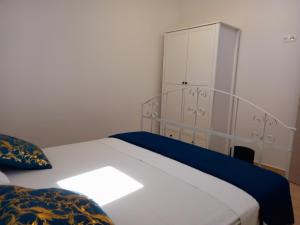 Posteľ alebo postele v izbe v ubytovaní Apartman La Marija