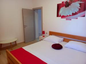 Posteľ alebo postele v izbe v ubytovaní Apartman La Marija