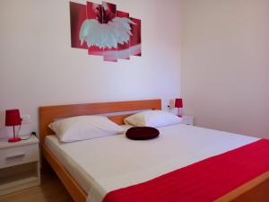 Posteľ alebo postele v izbe v ubytovaní Apartman La Marija