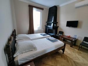 Letto o letti in una camera di Guesthouse White Swan