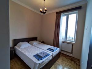 Letto o letti in una camera di Guesthouse White Swan