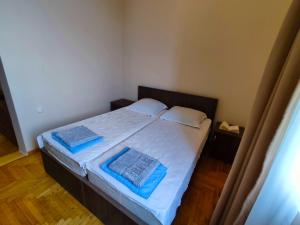 Letto o letti in una camera di Guesthouse White Swan