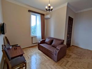 Area soggiorno di Guesthouse White Swan