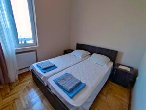 Letto o letti in una camera di Guesthouse White Swan