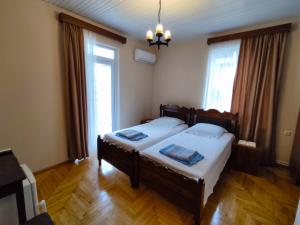 Letto o letti in una camera di Guesthouse White Swan