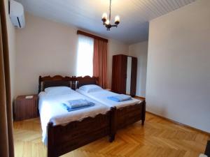 Letto o letti in una camera di Guesthouse White Swan
