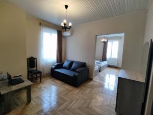 Area soggiorno di Guesthouse White Swan