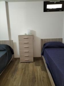 Posteľ alebo postele v izbe v ubytovaní Borgo San Martino