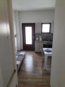 Posedenie v ubytovaní Borgo San Martino