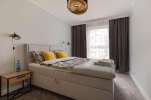 Posteľ alebo postele v izbe v ubytovaní Short Stay Apartments