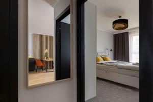 Posteľ alebo postele v izbe v ubytovaní Short Stay Apartments