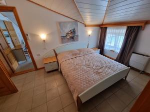 Ein Bett oder Betten in einem Zimmer der Unterkunft Villa Riva