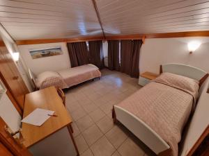 Ein Bett oder Betten in einem Zimmer der Unterkunft Villa Riva