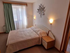 Ein Bett oder Betten in einem Zimmer der Unterkunft Villa Riva