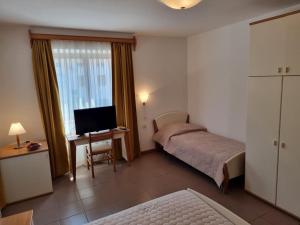 Ein Bett oder Betten in einem Zimmer der Unterkunft Villa Riva