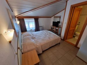 Ein Bett oder Betten in einem Zimmer der Unterkunft Villa Riva