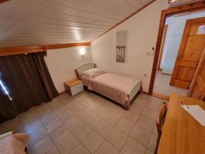 Ein Bett oder Betten in einem Zimmer der Unterkunft Villa Riva
