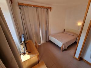 Ein Bett oder Betten in einem Zimmer der Unterkunft Villa Riva
