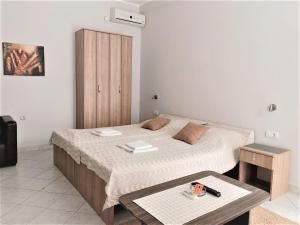 Letto o letti in una camera di Atrijum apartmani Apatin