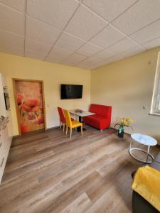 TV a/nebo společenská místnost v ubytování Haus Kim - Apartments
