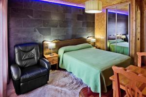 Postel nebo postele na pokoji v ubytování Hotel Doña Blanca