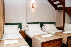 Cama ou camas em um quarto em Pousada Monte Azul