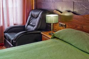 Postel nebo postele na pokoji v ubytování Hotel Doña Blanca