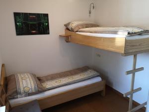 A bed or beds in a room at Apartment Schwarzindien