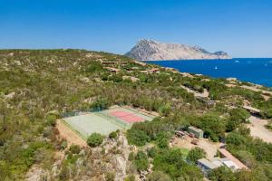 Photo de la galerie de l'établissement Seafront Villa - 5min to BRANDINCHI I Exclusive Garden I Private Beach I BBQ I Wi-Fi, à San Teodoro