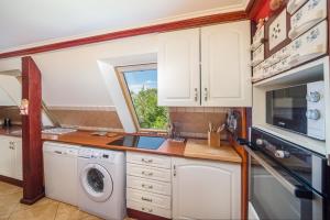 Kuchyň nebo kuchyňský kout v ubytování Tamás Apartman Balatonföldvár szívében- egész évben nyitva!