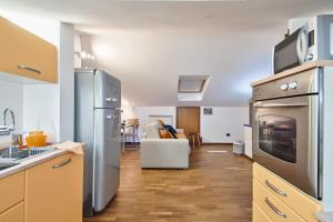 Dapur atau dapur kecil di 5 MIGLIA APARTMENT la mansarda a Collegno