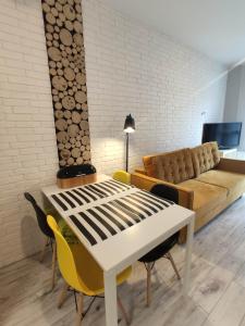Telewizja i/lub zestaw kina domowego w obiekcie Black House