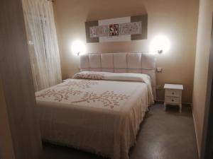 Gulta vai gultas numurā naktsmītnē Luxury Portorosa villa
