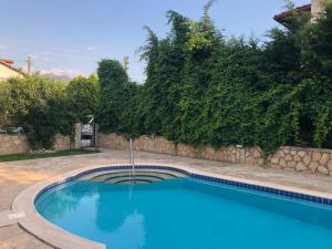The swimming pool at or close to Villa Etki