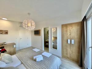Postel nebo postele na pokoji v ubytování Apartments and Rooms Mateša
