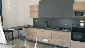 Una cocina o cocineta en Villetta vicino al mare 4 fotos más